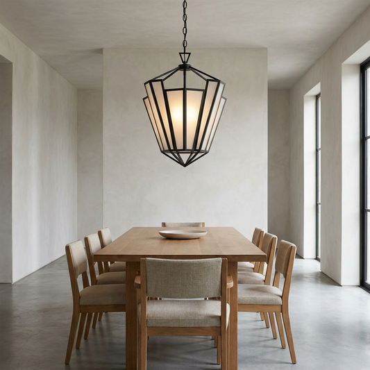 Sculptural geometric Art Deco pendant light above a dining table